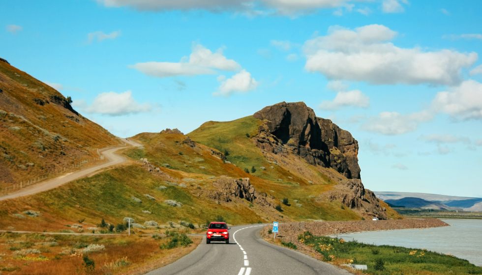 vehicle driving by water